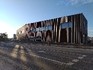 Welleternitfassade und Flachdach